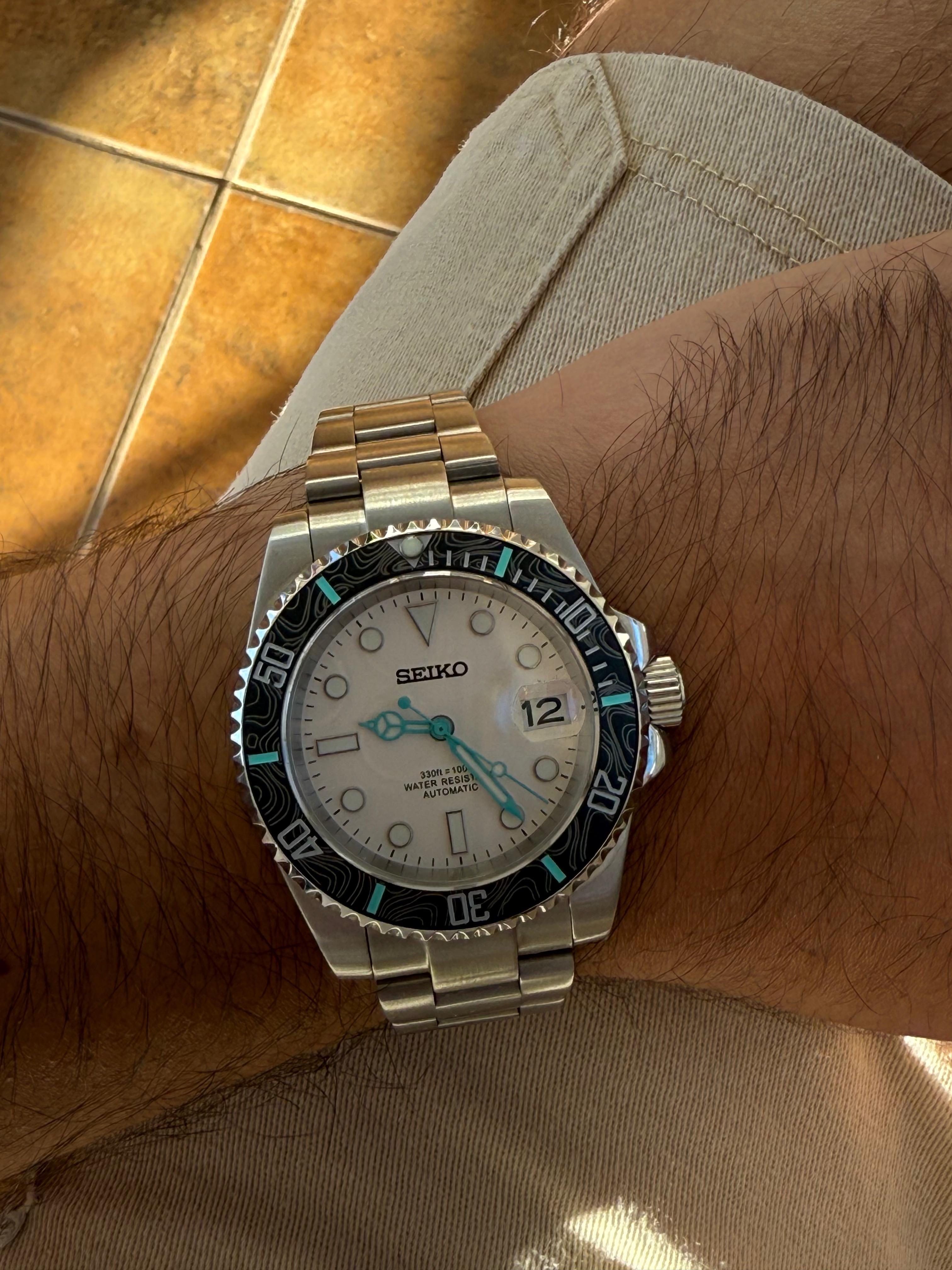 SUB mod acero — bisel cerámico con diseño ondulado